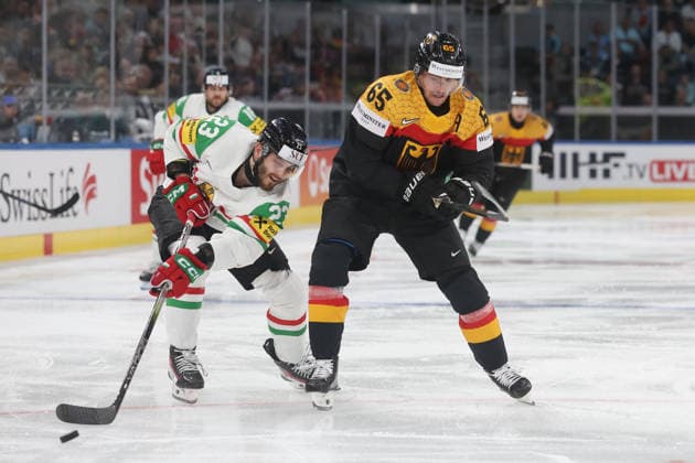 22 05 2026 Swiss Life Arena Zurich , SWITZERLAND, Mens Ice Hockey IIHF World Championship Zurich 2026 Group A GER HUN Zeteny Hadobas li,HUN vs Marc Michaelis GER