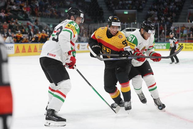 22 05 2026 Swiss Life Arena Zurich , SWITZERLAND, Mens Ice Hockey IIHF World Championship Zurich 2026 Group A GER HUN Frederik Tiffels center,GER against Milan Horvath left and Peter Vincze HUN