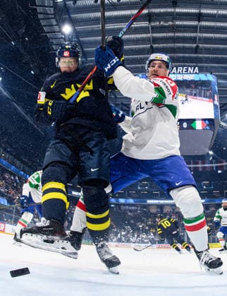 260522 Jacob Larsson of Sweden and Peter Spornberger of Italy during the 2026 IIHF Ice Hockey World Championship match between Sweden and Italy on May 22, 2026 in Fribourg Photo Jesper Zerman BILDBYRAN kod JZ JZ0726 ishockey ice hockey ishockey vm 2026 vm 2026 iihf world championship sverige sweden italien italy bbeng  Copyright: JESPERxZERMAN BB260522JZ155