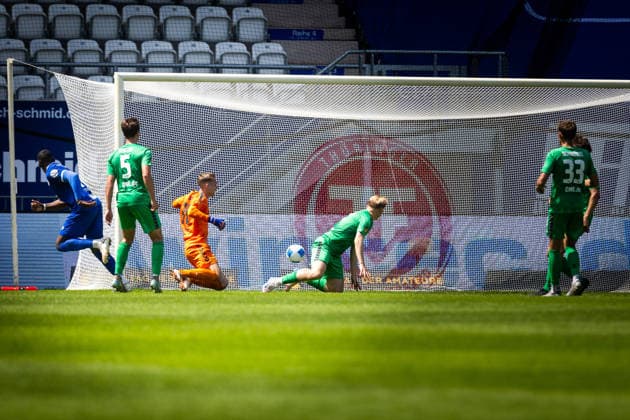 Jena , 230526, Final Soccer Thuringia Cup , FC Carl Zeiss Jena against ZFC Meuselwitz in the picture Manasse Eshele and Justin Schau Jena scores the goal to 1 0 next to Lukas Sedlak and Felix Rehder Meuselwitz