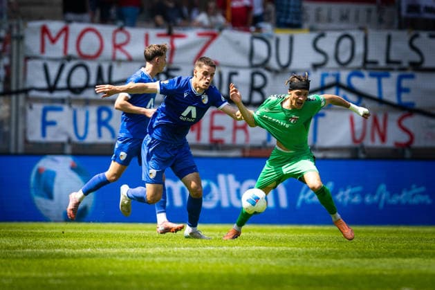 Jena , 230526, Final Soccer Thuringia Cup , FC Carl Zeiss Jena against ZFC Meuselwitz in the picture Timon Burmeister Jena against Elias Ndukwe Oke Meuselwitz
