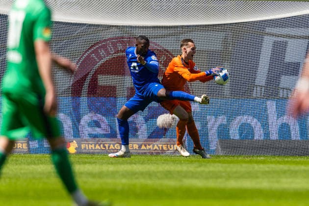 Jena , 230526, Final Soccer Thuringia Cup , FC Carl Zeiss Jena against ZFC Meuselwitz in the picture Manasse Eshele Jena against Lukas Sedlak Meuselwitz