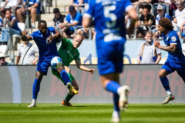 Jena , 230526, Final Soccer Thuringia Cup , FC Carl Zeiss Jena against ZFC Meuselwitz in the picture Manasse Eshele Jena against David Pfeil Meuselwitz