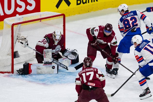 ZURICH, SWITZERLAND - MAY 23: Kristers Gudlevskis (Latvia, 50) keeping the shot from the USA during the Preliminary Round - Group A Match 37 between Latvia and United States at the IIHF Ice hockey, Eishockey World Championship, WM, Weltmeisterschaft 2026, Swiss Life Arena on May 23, 2026 in Zurich, Switzerland. Zurich Switzerland Copyright: xTimoxSteinx
