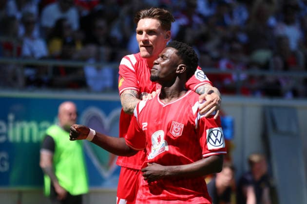 23 05 2026 Soccer men 2025 2026 dachbleche24 Landespokal Sachsen Anhalt Final VfB Germania Halberstadt Hallescher FC Leuna Chemie Stadion Halle Goal celebration of Bocar Baro Halle, 26, red and Niclas Stierlin Halle, 13, red after the 0 2 Halle Sachsen Anhalt Germany