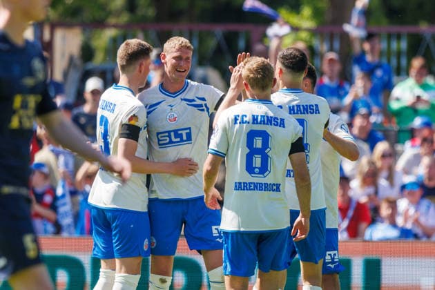 Goalscorer Emil Frost Holten Rostock to 2 0 cheers and is happy about his goal with f l Lukas Kunze Rostock , Cedric Harenbrock Rostock and Kenan Fatkic Rostock GER, FC Hansa Rostock vs SV Pastow, Football, Men, Lübzer Pils Landespokal, Final, Season 2025 2026, 23 05 2026 Greifswald Volksstadion Mecklenburg Vorpommern Germany