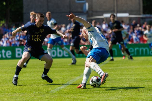 right Maximilian Krauß Rostock pulls away against Paul Valentin Bode Pastow to score 3 0 GER, FC Hansa Rostock vs SV Pastow, Football, Men, Lübzer Pils Landespokal, Final, Season 2025 2026, 23 05 2026 Greifswald Volksstadion Mecklenburg Vorpommern Germany