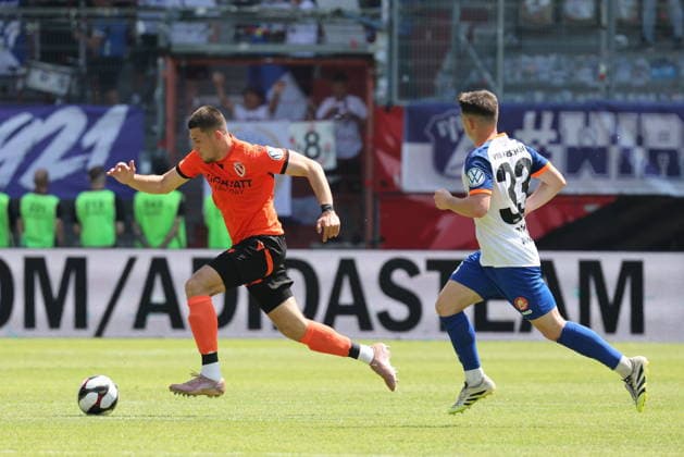 22 Mladen Cvjetinovic Energie Cottbus, l followed by 33 Paul Pahlow Krieschow Football Brandenburg State Cup 2025 2026 Final FC Energie Cottbus VfB Krieschow 1921