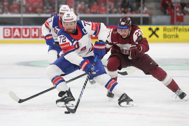 23 05 2026 Swiss Life Arena Zurich , SWITZERLAND, Mens Ice Hockey IIHF World Championship Zurich 2026 Group A LAT USA Justin Faulk li,USA vs Sandis Vilmanis LAT