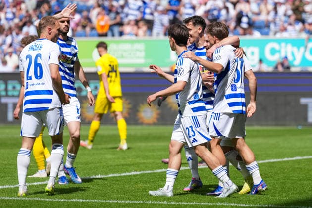 23 05 2026, xydrx, men, soccer, amateur final day, Niederrheinpokal final, SC St Tönis 11 20 MSV Duisburg, season 2025 2026, Schauinsland Reisen Arena Goal celebration after the 1-0 goal for MSV Duisburg by scorer Patrick Sussek MSV Duisburg, 37 together with Jan Simon Symalla MSV Duisburg, 23 and Florian Krueger MSV Duisburg, 26 Copyright: HMBxMedia YannisxDreimann