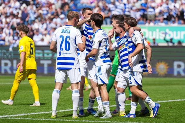 23 05 2026, xydrx, men, soccer, amateur final day, Niederrheinpokal final, SC St Tönis 11 20 MSV Duisburg, season 2025 2026, Schauinsland Reisen Arena Goal celebration after the 1-0 goal for MSV Duisburg by scorer Patrick Sussek MSV Duisburg, 37 together with Jan Simon Symalla MSV Duisburg, 23 and Florian Krueger MSV Duisburg, 26 Copyright: HMBxMedia YannisxDreimann