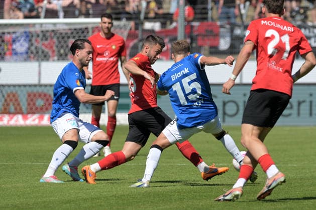 Marius Kunde SG Sonnenhof Grossaspach, 16 on with ball in duel with David Tomic SV Stuttgarter Kickers, 08 and Nico Blank SV Stuttgarter Kickers, 15 SV Stuttgarter Kickers vs SG Sonnenhof Grossaspach, Football, Men, DB Regio wfv Cup Final, Season 2025 2026, 23 05 2026 SV Stuttgarter Kickers vs SG Sonnenhof Grossaspach, Football, Men, DB Regio wfv Cup Final, Season 2025 2026, 23 05 2026 Stuttgart Copyright: xEibner-Pressefoto TobiasxBaurx EP_TBR