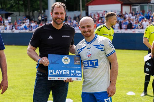 left President of the Landesfußballverband Mecklenburg Vorpommern LFV Dr. Heiko Lex with the player of the day Maximilian Krauß Rostock GER, FC Hansa Rostock vs SV Pastow, Football, Men, Lübzer Pils Landespokal, Final, Season 2025 2026, 23 05 2026 Greifswald Volksstadion Mecklenburg Vorpommern Germany