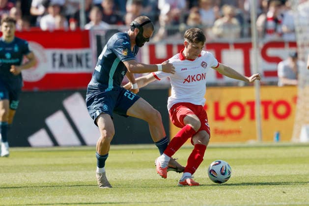 from left to right Sigurd Haugen TSV 1860 Munich and Tim Kraus Würzburger Kickers in the final of the Bavarian Toto Cup between FC Würzburger Kickers and TSV 1860 Munich at Stadion am Dallenberg, Würzburg, Germany, on May 23, 2026 Copyright: HMBxMedia xHeikoxBecker