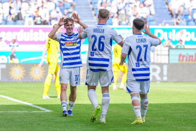 23 05 2026, xydrx, men, soccer, amateur final day, Niederrheinpokal final, SC St Tönis 11 20 MSV Duisburg, season 2025 2026, Schauinsland Reisen Arena Goal celebration after the 3-0 goal for MSV Duisburg by scorer Patrick Sussek MSV Duisburg, 37 together with Florian Krueger MSV Duisburg, 26 and Can Coskun MSV Duisburg, 27 Copyright: HMBxMedia YannisxDreimann