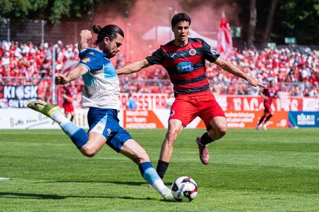 Cologne, Germany 23 May 2026 Mittelrheinpokal 2025 2026 Final Viktoria Köln vs Fortuna Köln In the picture from left in duel David Haider Al Azzawe Fortuna and Jakob Sachse VIK DFL DFB regulations prohibit any use of photographs as image sequences and or quasi video Sportpark Höhenberg Nordrhein Westfalen Copyright: xFotostandx xKruczynskix