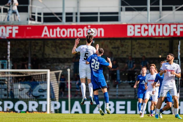 L R Martin Ens SC Verl, 05 , Yari Otto SC Verl, 28 in header duel GER, SC Verl vs SF Lotte, Football, Westfalenpokal, Final, Season 2025 2026, 23 05 2026 DFL Regulations prohibit any use of photographers as image sequences and or quasi video GER, SC Verl vs SF Lotte, Football, Westfalenpokal, Final, Season 2025 2026, 23 05 2026 Verl Copyright: xEibner-Pressefoto JanxRollingerx EP_JSK