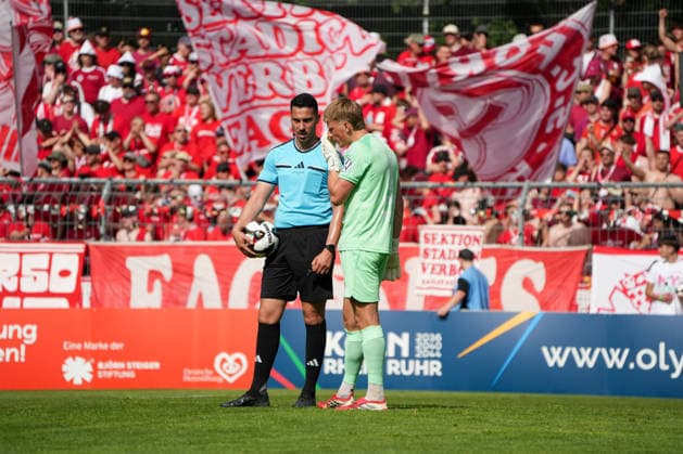 Germany Bitburger Pokalfinale 2026, S C Fortuna Köln vs Viktoria Köln 23 05 2026 Sportpark Höhenberg Köln Referee in conversation with Lennart Winkler Fortuna Köln, 1 Köln Germany Copyright: xMijoxLubecx