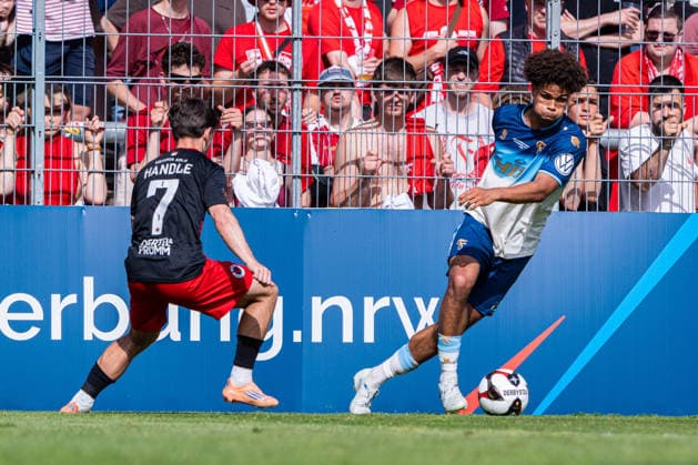 Cologne, Germany 23 May 2026 Mittelrheinpokal 2025 2026 Final Viktoria Köln vs Fortuna Köln Pictured from left in duel Simon Handle VIK and Neo Telle Fortuna DFL DFB regulations prohibit any use of photographs as image sequences and or quasi video Sportpark Höhenberg Nordrhein Westfalen Copyright: xFotostandx xKruczynskix