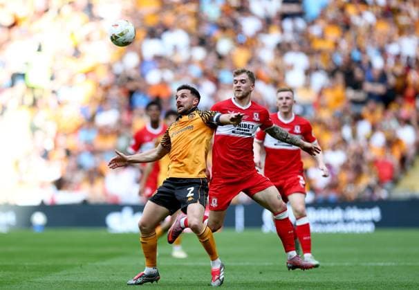Lewis Coyle of Hull City in action against Riley McGree of Middlesbrough Hull City v Middlesbrough, EFL Sky Bet Championship, Play-Off Final, Football, Wembley Stadium, London, UK - 23 May 2026London Wembley Stadium United Kingdom EDITORIAL USE ONLY No use with unauthorised audio, video, data, fixture lists, club league logos or live services. Online in-match use limited to 120 images, no video emulation. No use in betting, games or single club league player publications. Copyright: xSimonxDael Shutterstockx 16887368cp