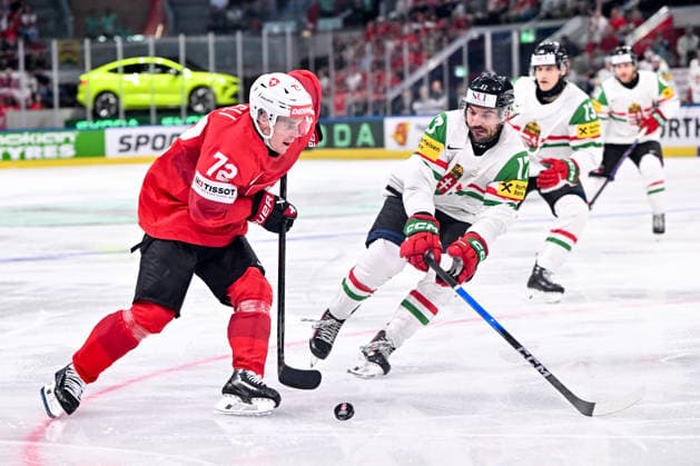 ZURICH, SWITZERLAND MAY 23 Dominik Egli of Switzerland in action against Roland Kiss of Hungary during the 2026 IIHF Ice Hockey World Championship Switzerland game between Switzerland and Hungary at Swiss Life Arena on May 23, 2026 in Zurich, Zurich Zurich Swiss Life Arena Zurich Switzerland Copyright: xJustPictures.ch AndreaxBrancax jp-en-EuSpIm-JP7_ANB_Sui_Hung_23052026_3299