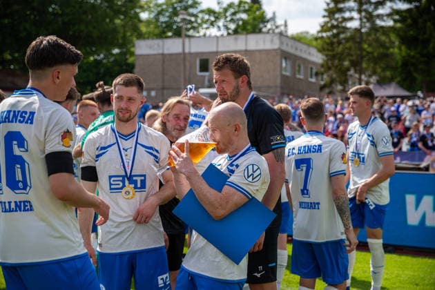 Maximilian Krauß FCH, mi treats himself to a big sip of beer from the Lüpzer Kelch GER, Football, State Cup, Lüpzer Pils Cup, Final, SV Pastow FC Hansa Rostock