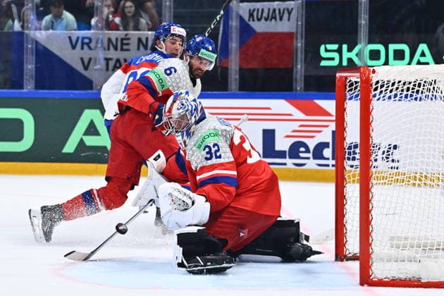 L-R Goalkeeper Josef Korenar, Michal Kempny (CZE) and Martin Chromiak (SVK) in action during the group B match of the World Ice hockey, Eishockey Championship, Slovakia - Czech Republic, Fribourg, Switzerland, on May 23, 2026. (CTKxPhoto RadekxPetrasek) CTKPhotoP2026052305169  CTKPhotoP2026052305169