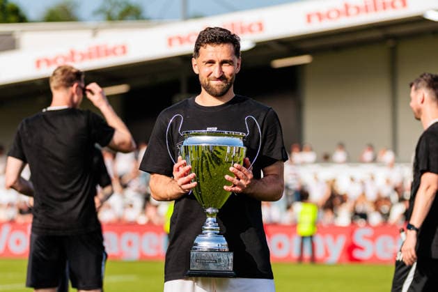 Berkan Taz SC Verl, 10 celebrates with the trophy after winning the final of the Krombacher Westfalenpokal GER, SC Verl vs SF Lotte, Football, Westfalenpokal, Final, Season 2025 2026, 23 05 2026 DFL Regulations prohibit any use of photographers as image sequences and or quasi video GER, SC Verl vs SF Lotte, Football, Westfalenpokal, Final, Season 2025 2026, 23 05 2026 Verl Copyright: xEibner-Pressefoto JanxRollingerx EP_JSK