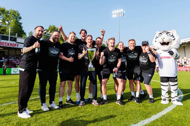 The SC Verl coaching team celebrates after winning the final of the Krombacher Westfalenpokal, Tobias Strobl SC Verl, head coach holds the cup GER, SC Verl vs SF Lotte, Football, Westfalenpokal, Final, Season 2025 2026, 23 05 2026 DFL Regulations prohibit any use of photographers as image sequences and or quasi video GER, SC Verl vs SF Lotte, Football, Westfalenpokal, Final, Season 2025 2026, 23 05 2026 Verl Copyright: xEibner-Pressefoto JanxRollingerx EP_JSK