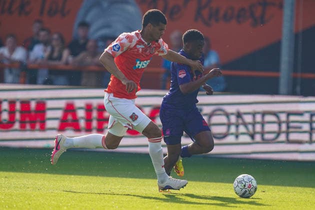 2026-05-23 FC Volendam v Willem II - Dutch Eredivsie Kwalificatie - Finale VOLENDAM, NETHERLANDS - MAY 23: Precious Ugwu of FC Volendam battles for possession with Samuel Bamba of Willem II during the Dutch Eredivsie Kwalificatie - Finale match between FC Volendam and Willem II at Kras Stadion on May 23, 2026 in Volendam, Netherlands. Volendam Kras Stadion Netherlands Content not available for redistribution in The Netherlands directly or indirectly through any third parties. Copyright: xAndrexWeeningx