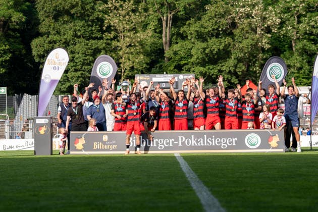 With the cup in hand The team of Viktoria Köln celebrates the victory, cup handover, award ceremony, jubilation after the final whistle, victory, winner, winners, cheers, cheering, joy, optimistic, action, action SC Fortuna Köln vs Viktoria Köln 23 05 2026 Football, Bitburger Cup Final 2026, GER, Sportpark Höhenberg, Cologne Copyright: HMBxMedia xMarcoxBader