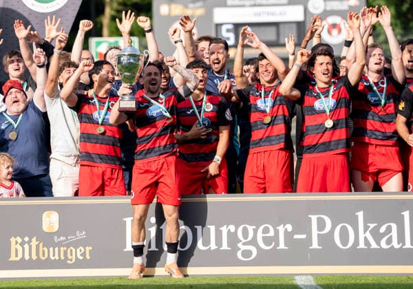 With the cup in hand The team of Viktoria Köln celebrates the victory, cup handover, award ceremony, jubilation after the final whistle, victory, winner, winners, cheers, cheering, joy, optimistic, action, action SC Fortuna Köln vs Viktoria Köln 23 05 2026 Football, Bitburger Cup Final 2026, GER, Sportpark Höhenberg, Cologne Copyright: HMBxMedia xMarcoxBader