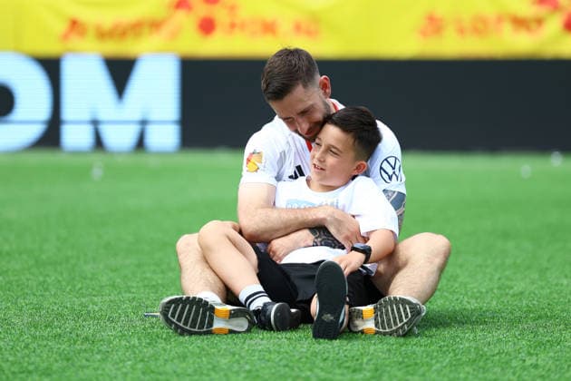 14 Raoul Bouveron HEBC with his son on the pitch after the final whistle Football I Mens I Lotto Cup I 2025 2026 season I Final I SC Vorwärts Wacker04 Billstedt HEBC I 23 05 2026 I Hoheluft stadium