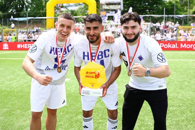 5 Semir Demirovic HEBC , 11 Hammed Nawaz HEBC and 33 Muhammet Ali Aktürk HEBC celebrate with the Hamburg Lotto Cup Football I Mens I Lotto Cup I Season 2025 2026 I Final I SC Vorwärts Wacker04 Billstedt HEBC I 23 05 2026 I Stadion Hoheluft