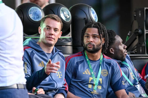 Goalkeeper Manuel Neuer FC Bayern Munich and Serge Gnabry FC Bayern Munich gestures Looks on during the DFB Cup Final 2026 match between FC Bayern Munich and VfB Stuttgart at Olympiastadion on May 23, 2026 in Berlin, Germany Photo by Harry Langer DeFodi Images