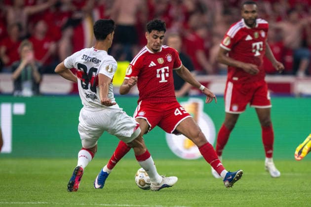 Chema Jose Maria Andres Baixauli VfB Stuttgart and Aleksandar Pavlovic FC Bayern Muenchen xettx, Germany, Berlin, 23 05 2026, Football, DFB Pokal FC Bayern Muenchen vs VfB Stuttgart, Season 2025 2026, Final, Olympiastadion DFL DFB REGULATIONS PROHIBIT ANY USE OF PHOTOGRAPHS AS IMAGE SEQUENCES AND OR QUASI VIDEO