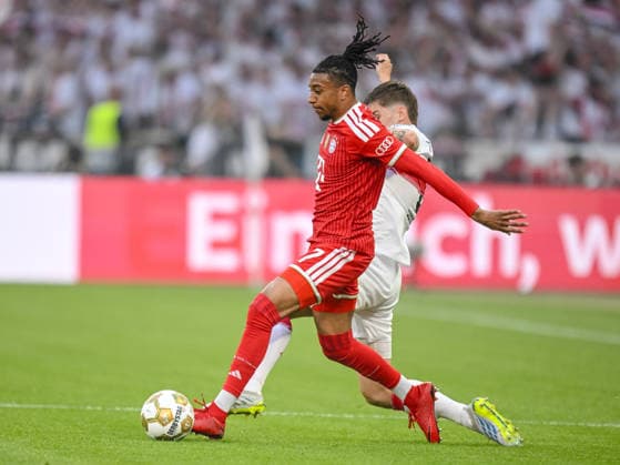 Michael Olise FC Bayern München and Ramon Hendriks VfB Stuttgart battle for the ball during the DFB Cup Final 2026 match between FC Bayern München and VfB Stuttgart at Olympiastadion on May 23, 2026 in Berlin, Germany Photo by Harry Langer DeFodi Images