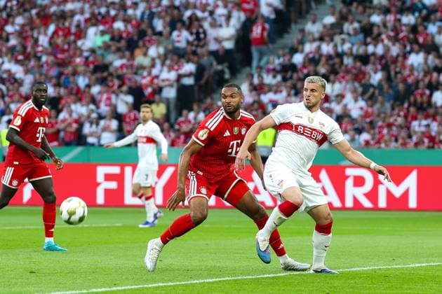 in duel, action, with Jonathan Tah 4 FC Bayern Muenchen , Emredin Demirovic 9 VfB Stuttgart , FC Bayern Muenchen vs VfB Stuttgart, Football, 83 DFB Pokalfinale, 23 05 2026 DFL DFB regulations prohibit any use of photographs as image sequences and or quasi video Berlin Berlin Germany Copyright: xkolbert-press ChristianxKolbertx