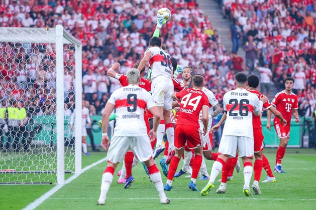 23 05 2026, Football, 83 DFB Cup Final,, FC Bayern München VfB Stuttgart, Olympioastadion Berlin, Season 2025 2026 Jonas Urbig FC Bayern Muenchen 40 defends the goal against Chema Andres VfB Stuttgart 30 DFB regulations prohibit any use of photographs as image sequences and or quasi video Berlin Germany