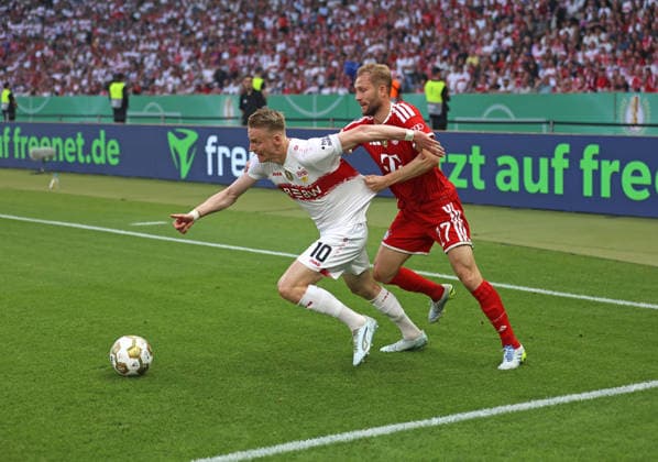 Football, Men, DFB Pokal Final, Season 2025 2026, FC Bayern München VFB Stuttgart, Olympiastadion Berlin Chris Führich Fuehrich VFB Stuttgart li with Konrad Laimer FC Bayern München re in duel for the ball DFB, DFL regulations prohibit any use of photographs as image sequences and or quasi video