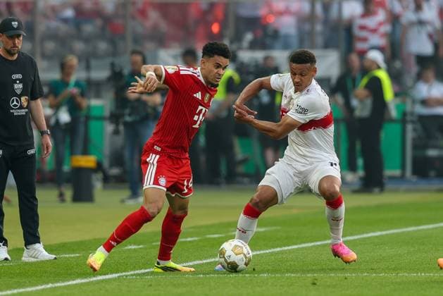 in duel, action, with Luis Diaz 14 FC Bayern Muenchen , Luca Antony Jaquez 14 VfB Stuttgart , FC Bayern Muenchen vs VfB Stuttgart, Football, 83 DFB Pokalfinale, 23 05 2026 DFL DFB regulations prohibit any use of photographs as image sequences and or quasi video Berlin Berlin Germany Copyright: xkolbert-press ChristianxKolbertx
