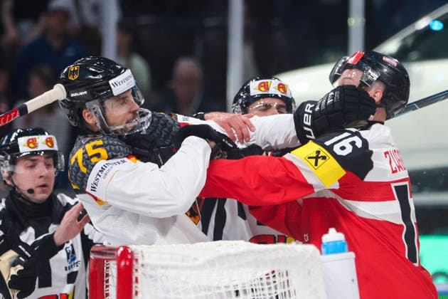 Ice hockey, Eishockey - IIHF WC 2026 ZURICH,SWITZERLAND,23.MAY.26 - ICE HOCKEY - IIHF Ice Hockey World Championship, WM, Weltmeisterschaft 2026, group stage, Austria vs Germany. Image shows Samuel Dove-McFalls (GER) and Dominic Zwerger (AUT)  GEPAxpictures xMaticxKlansek