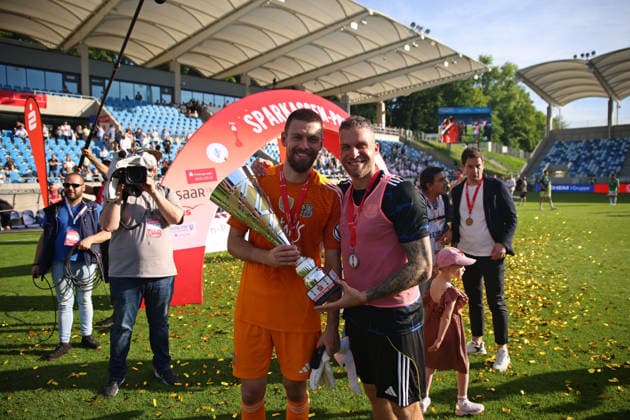 23 05 2026, Football, Men, Sparkassen Pokal Saarland Final, Season 2025 2026, 1 FC Saarbrücken FC 08 Homburg, Phillip Menzel 1 FC Saarbruecken and Patrick Schmidt 1 FC Saarbruecken pose with the cup Saarbrücken Ludwigsparkstadion Saarland Germany DEU Copyright: xFabianxKleerx