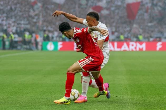 in duel, action, with Luis Diaz 14 FC Bayern Muenchen , Jamie Leweling 18 VfB Stuttgart , FC Bayern Muenchen vs VfB Stuttgart, Football, 83 DFB Pokalfinale, 23 05 2026 DFL DFB regulations prohibit any use of photographs as image sequences and or quasi video Berlin Berlin Germany Copyright: xkolbert-press ChristianxKolbertx