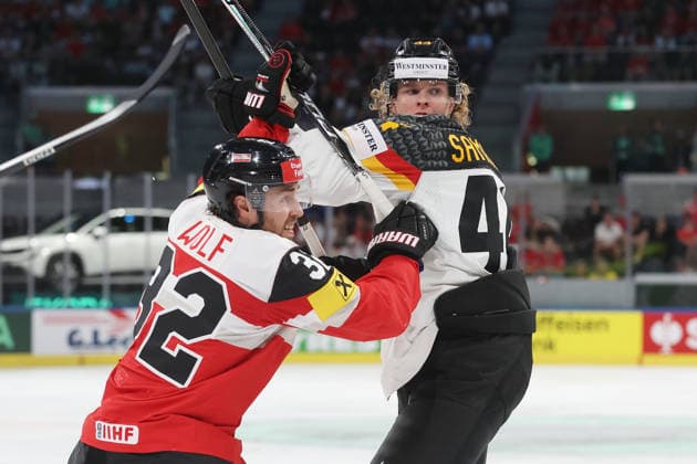 23 05 2026 Swiss Life Arena Zurich , SWITZERLAND, Men Ice Hockey IIHF World Championship Zurich 2026 Group A AUT GER Bernd Wolf li,AUT against Joshua Samanski GER