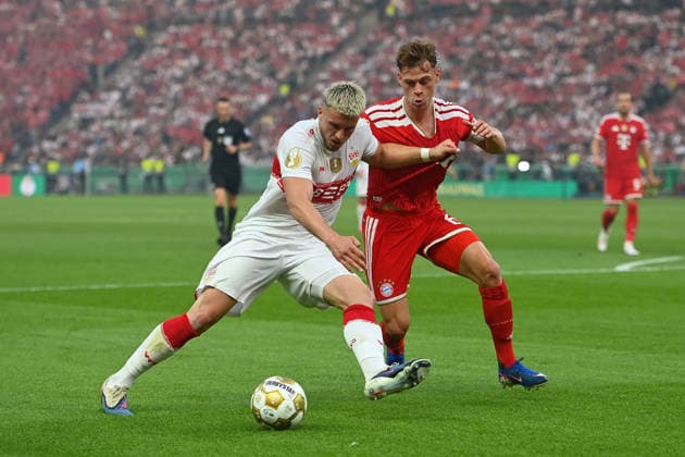 Ermedin DEMIROVIC VFB Stuttgart , Joshua KIMMICH Bayern Muenchen , action,duel football 83 DFB Pokal Final 2026 FC Bayern Muenchen VfB Stuttgart on 23 05 2026, Olympiastadion in Berlin DFL DFB regulations prohibit any use of photographs as image sequences and or quasi video