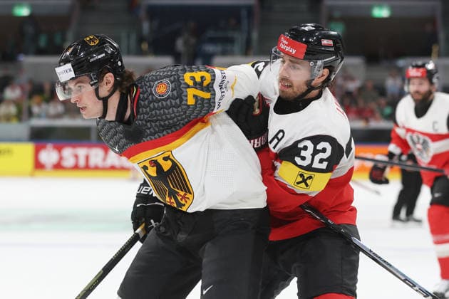 23 05 2026 Swiss Life Arena Zuerich , SWITZERLAND, Mens Ice Hockey IIHF World Championship Zurich 2026 Group A AUT GER Lukas Reichel li,GER vs Bernd Wolf AUT