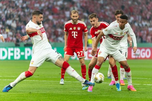 Jeff Chabot VfB Stuttgart, 24 clears the ball, Josip Stanisic FC Bayern Muenchen, 44 , Luca Jaquez VfB Stuttgart, 14 , GER, FC Bayern Muenchen vs VfB Stuttgart, Football, Men, DFB Pokal, Final, Season 2025 2026, 23 05 2026 DFL REGULATES PROHIBIT ANY USE OF PHOTOGRAPHS AS IMAGE SEQUENCES AND OR QUASI VIDEO GER, FC Bayern Muenchen vs VfB Stuttgart, Football, Men, DFB Pokal, Final, Season 2025 2026, 23 05 2026 Berlin Copyright: xEibner-Pressefoto MaxxVincenx EP_MVN