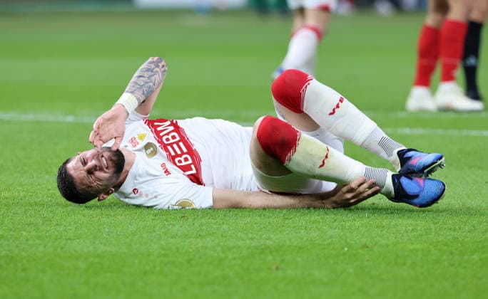 Jeff Chabot injured after duel Match scene Action Sport Football Soccer Final DFB Pokal 2026 Season 2025 2026 23 05 2026 FC Bayern Munich FCB vs VfB Stuttgart