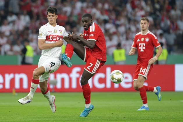 Chema Andres VfB Stuttgart and Dayot Upamecano FC Bayern München battle for the ball during the DFB Cup Final 2026 match between FC Bayern München and VfB Stuttgart at Olympiastadion on May 23, 2026 in Berlin, Germany Photo by Oliver Kaelke DeFodi Images